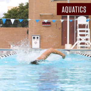 Man swimming freestyle inrthe outdoor pool at the Student Rec Center. Aquatics is written in a maroon box in the top right corner.