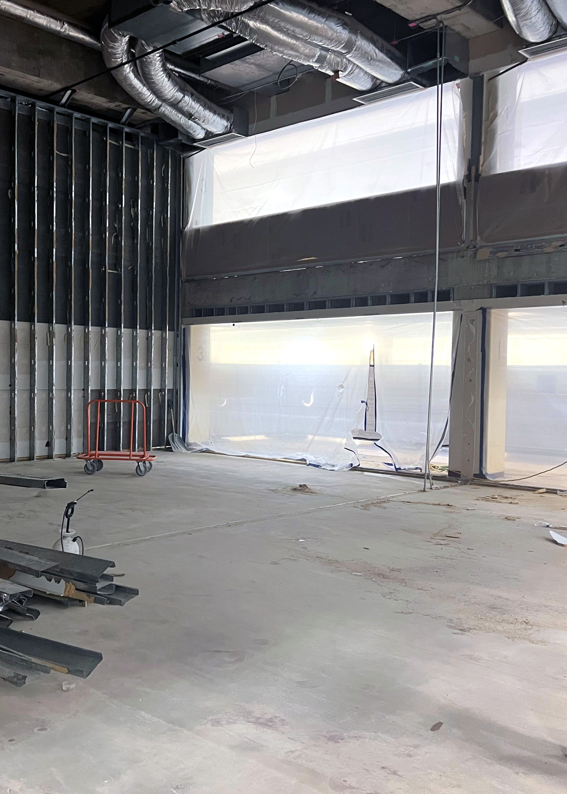Empty racquetball court with now walls or flooring.