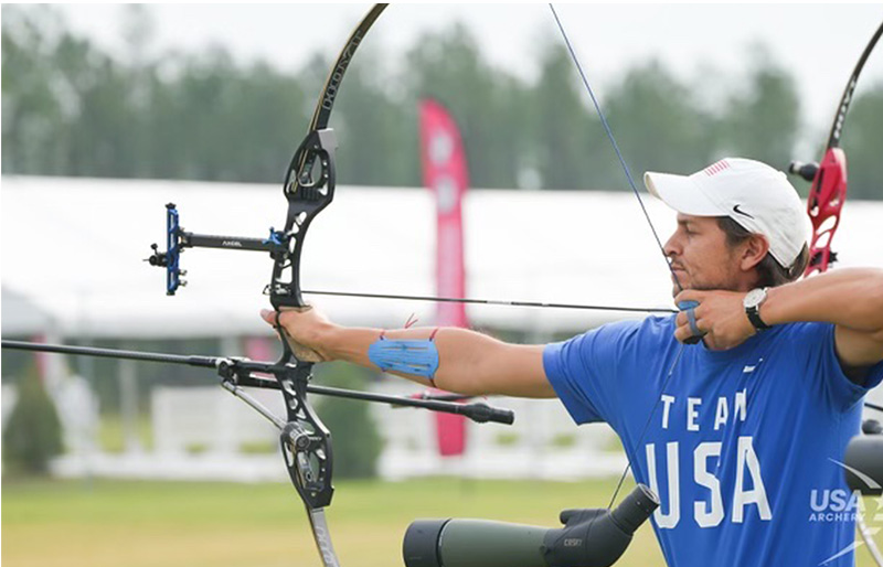 Trenton Cowles aims at the target during the 2024 USA Archery Olympic Trials.