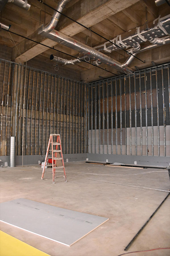 Internal view of the Racquetball Courts being transitioned into the new bouldering wall.