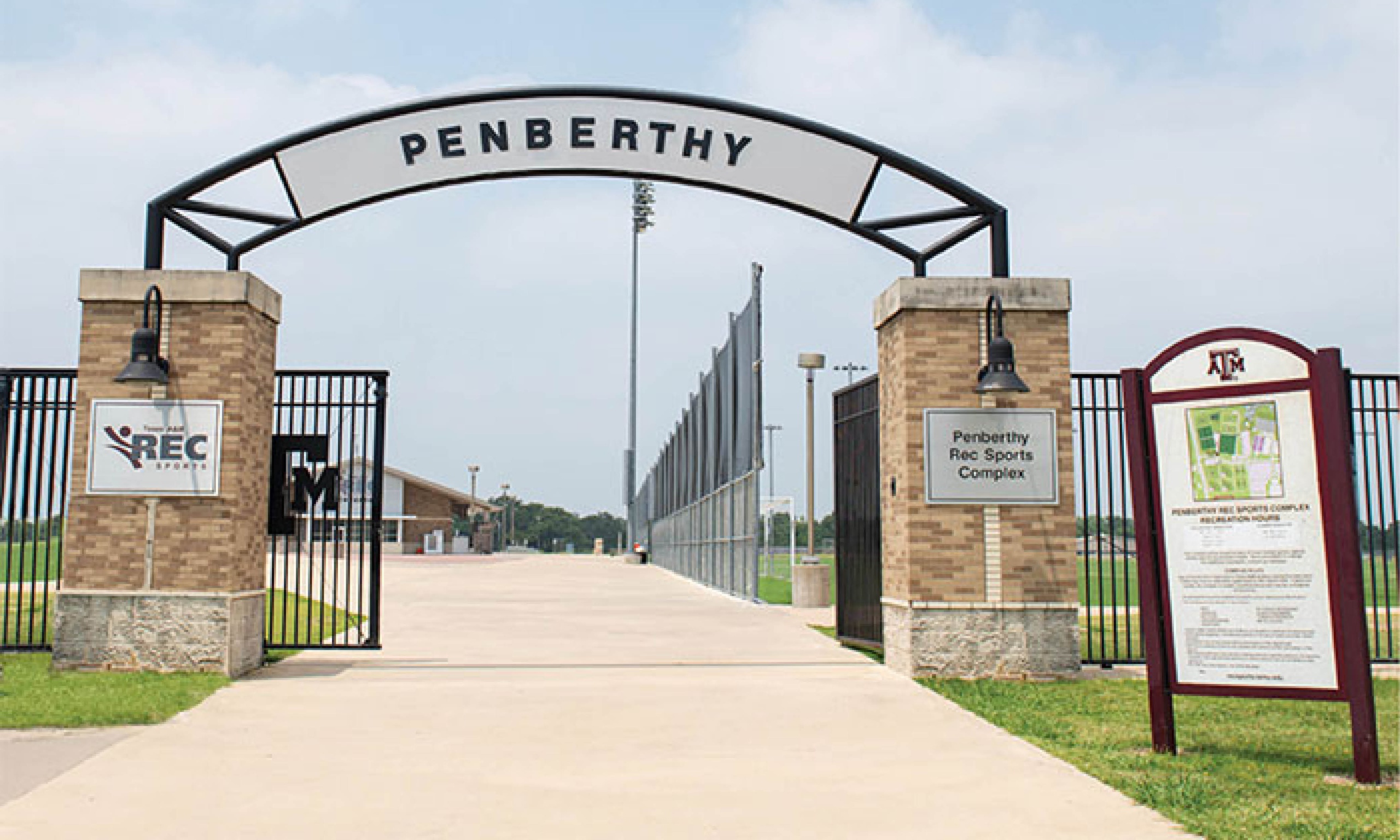 A gate displaying a sign reading "penberthy".