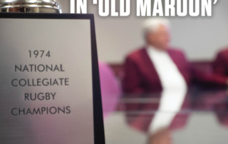 Photo of the 1974 trophy with text on top that says Three photos merged together, the one on the left is a signed football by the alumni rugby players, the middle photo is the rugby trophy, and the photo on the right is of the current rugby team playing the sport. The text over the top says, "A legacy lives in old maroon."