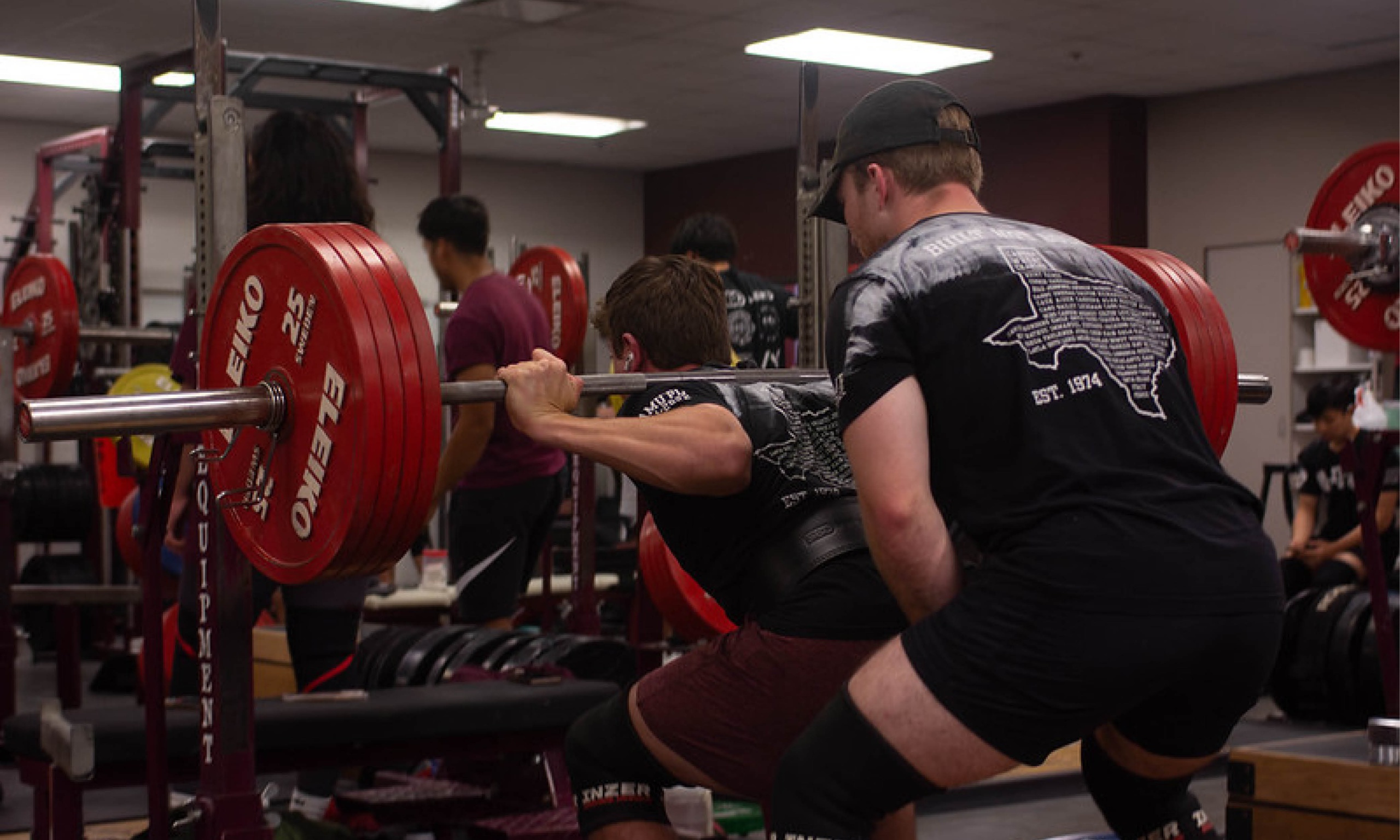 Weightlifting club in competing in a tournament in the PEAP building at Texas A&M University.