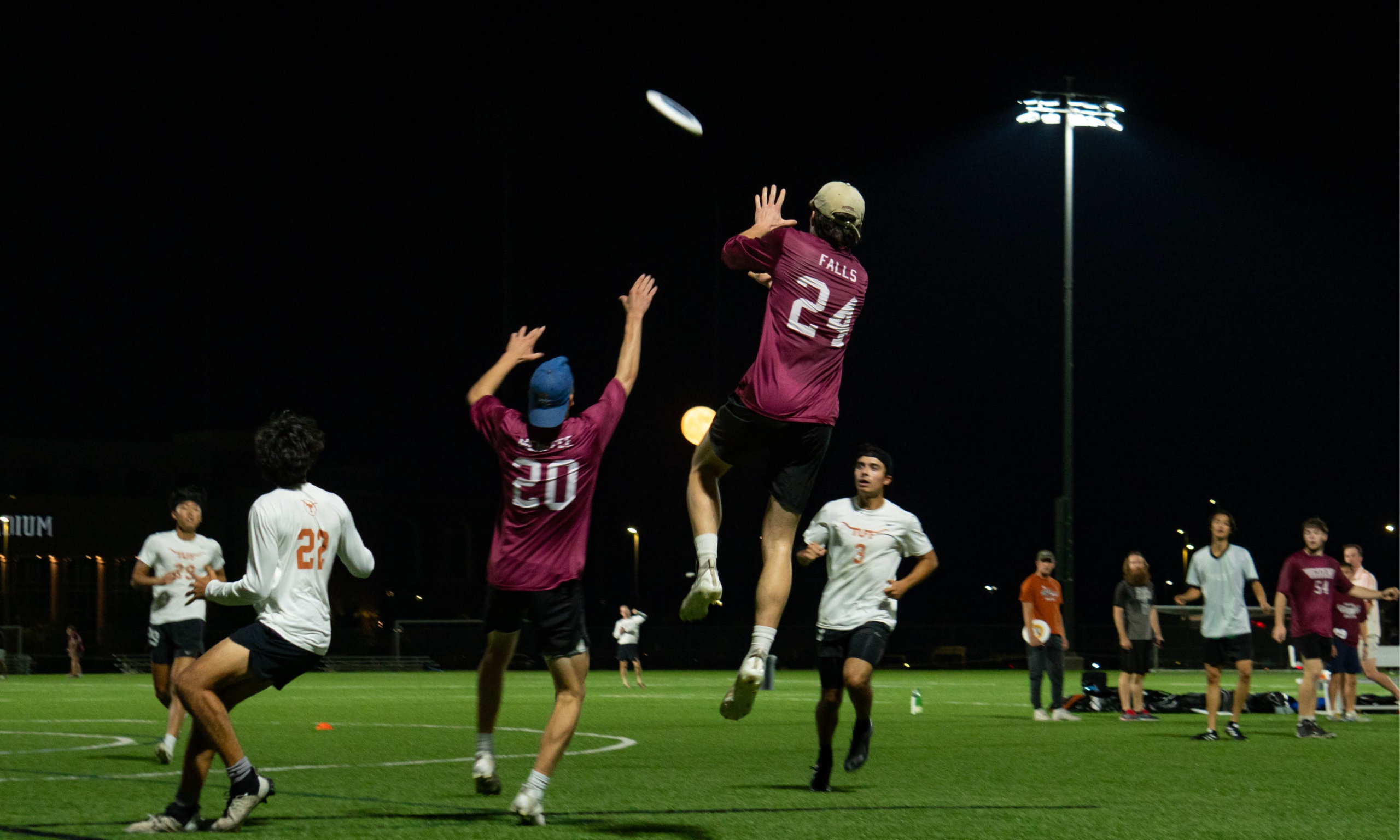 Men's Ultimate club playing a game of ultimate frisbee at the Penberthy Rec Sports Complex.