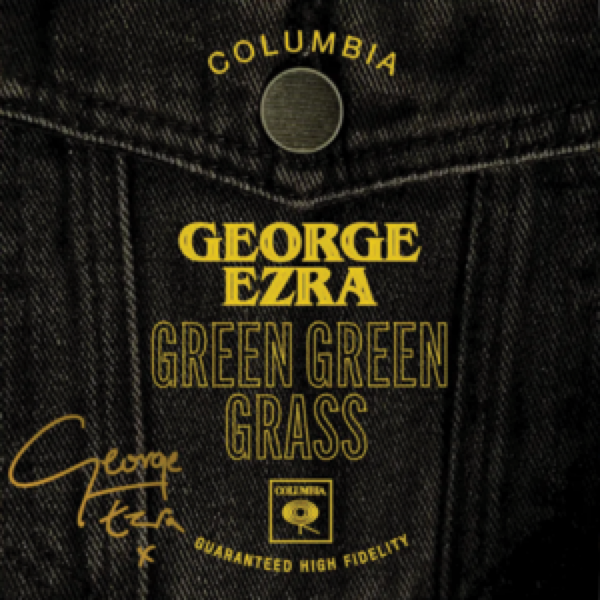 Album cover for 'Green Green Grass' by George Ezra, featuring the artist's name and album title on a textured, black denim background with the Columbia logo.