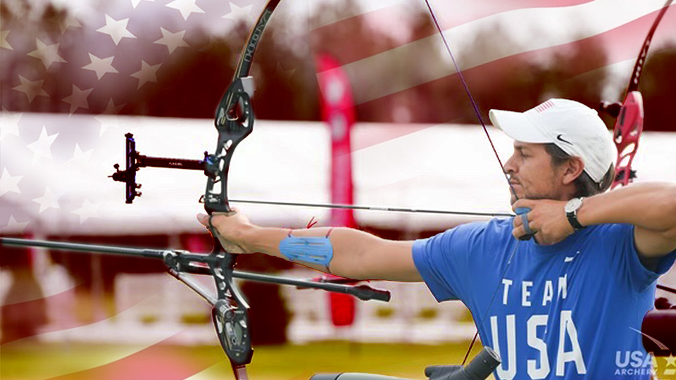 Trenton Cowles is holding his bow and arrow playing archery, competing to be on the United States Olympic Archery Team.