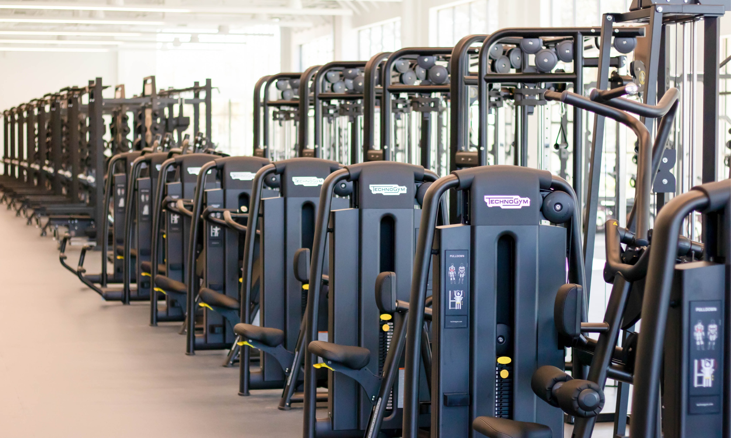 Overview of the leg lift equipment inside the Strength & Conditioning room at the Polo Road Rec Center
