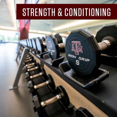 Lots of free lift weights displayed on the proper racks within the Strength & conditioning room at the Student Rec Center. Strength and Conditioning is written in a maroon rectangle in the top right corner.