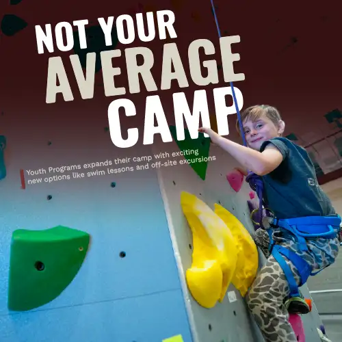 Young camper climbing an indoor rock wall at the Student Rec Center with “Not Your Average Camp” text overlay.