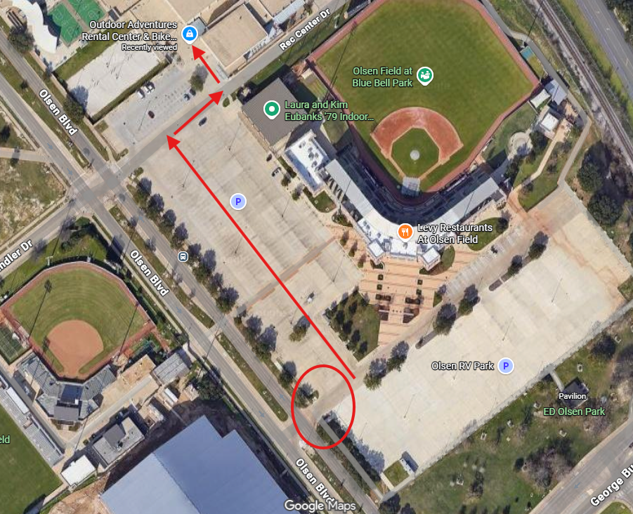 Aerial map view showing walking route from Olsen RV Park parking area along Olsen Boulevard to the Outdoor Adventures Rental Center, marked with red arrows and a circled starting point.